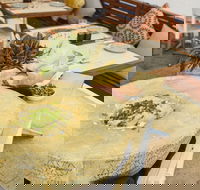 Flaming Cheese Wheel and Wine Experience Broadway - Accommodation Gold Coast