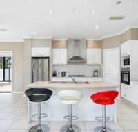 Central Gold Coast Large Modern Elevated Home - Accommodation Gold Coast
