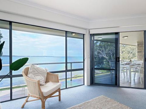 3 Pelican Sands 83 Soldiers Point Rd Stunning Waterfront Unit With Magical Water Views & Air Conditioning - Accommodation Gold Coast 1