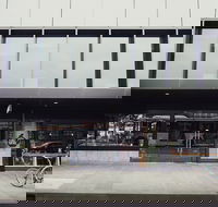 De Mad Hatter - Accommodation Gold Coast
