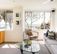 Waterfront Apartment Brimming with Inspirational Artwork - Accommodation Gold Coast