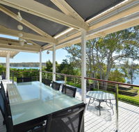 Morisset Bay Waterfront Views Lake House looking over Trinity Marina - Gold Coast 4U