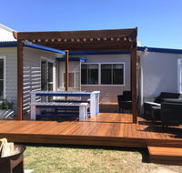 Shellharbour Beach Cottage - walk onto Patrolled beach with flags in summer - Accommodation Gold Coast