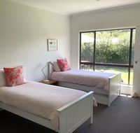 Spray Point Beach House entertaining deck - Accommodation Gold Coast