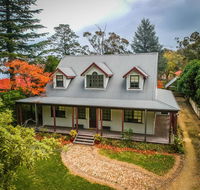 Whispering Pines Cottages - Gold Coast 4U