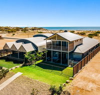 108 Madaffari Drive - Caretta - Luxurious Marina Home With A Spa and Free WiFi - Gold Coast 4U
